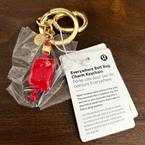 Lululemon red everywhere belt bag charm keychain NWT